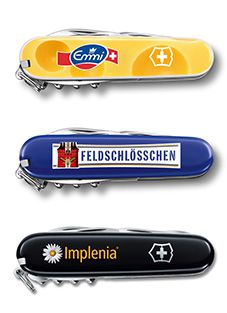 Taschenmesser bedruckt mit unterschiedlichen Firmen Logos. Implenia, Feldschlösschen und Emmi